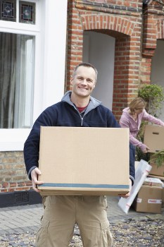 Loading furniture into a removals van for a local Earls Court move