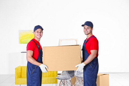 Moving team handling stairs and access in Earls Court
