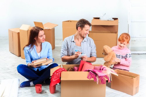 Moving van and packed boxes for a house removal in Earls Court