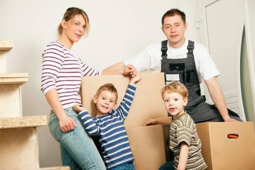 Furniture being carried from an Earls Court flat with stair access