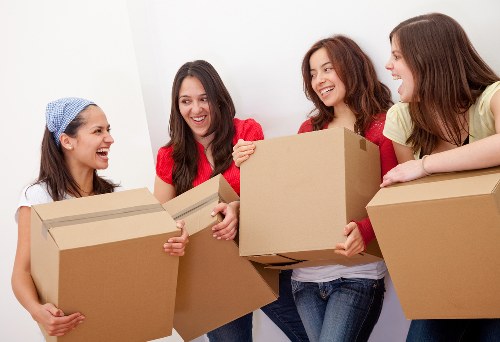 Removal van and moving boxes for Earls Court home relocations