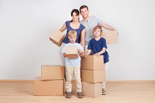Moving van and removal crew planning an Earls Court property move