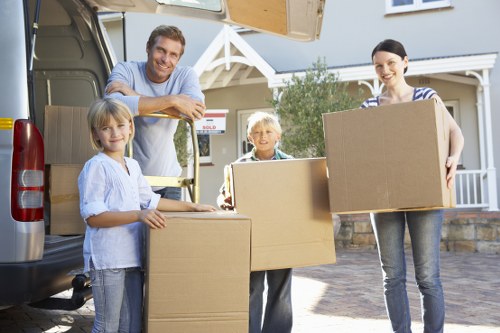 Packed moving boxes and furniture ready for a home removal in Earls Court