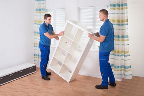 Local van service handling a residential delivery in Earls Court