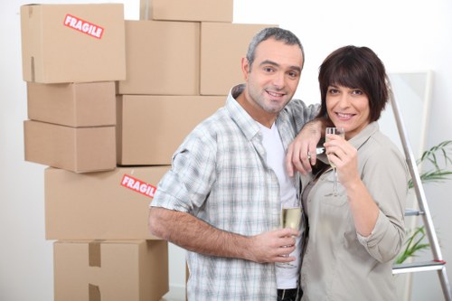 Loading household boxes into a van for an Earls Court relocation
